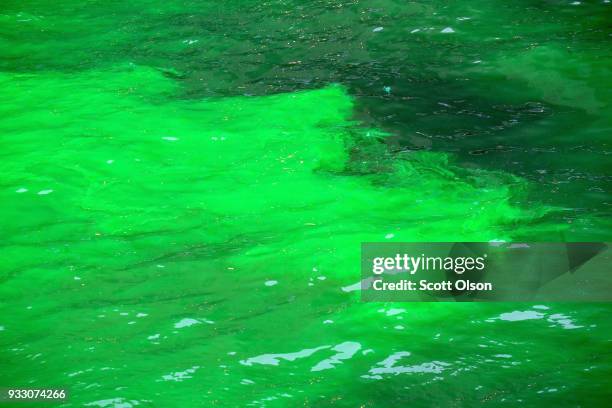 Members of the local plumber's union dye the Chicago River green in celebration of St. Patrick's Day on March 17, 2018 in Chicago, Illinois. Dyeing...