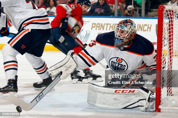 Goaltender Cam Talbot of the Edmonton Oilers defends the net during first period action against the Florida Panthers at the BB&T Center on March 17,...