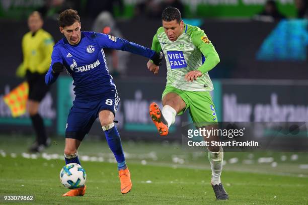 Jeffrey Bruma of Wolfsburg is chased by Leon Goretzka of Schalke during the Bundesliga match between VfL Wolfsburg and FC Schalke 04 at Volkswagen...