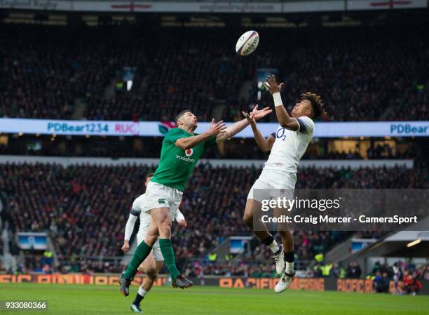 Rob Kearney of Ireland competes for a high ball with Anthony Watson of England which leads to the opening try during the NatWest Six Nations...