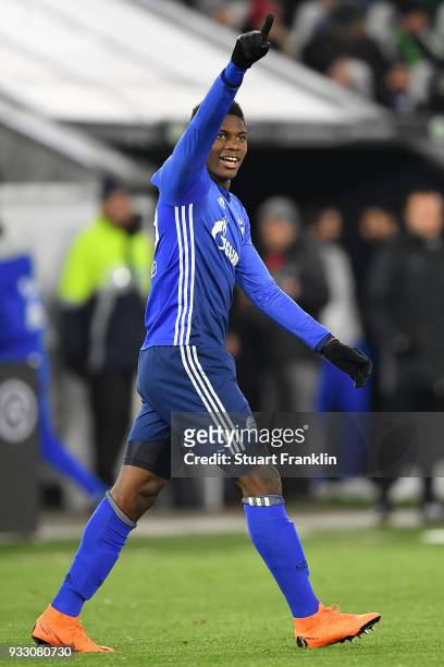 Breel Embolo of Schalke celebrates an own goal by Robin Knoche of Wolfsburg to make it 0:1 during the Bundesliga match between VfL Wolfsburg and FC...