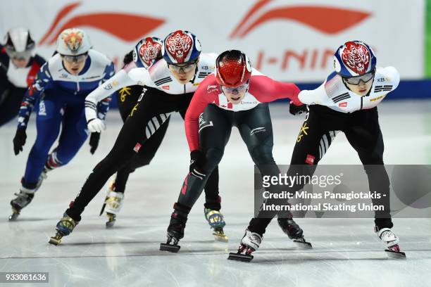 Min Jeong Choi of Korea takes the lead over Kim Boutin of Canada in the women's 1500 meter finals during the World Short Track Speed Skating...