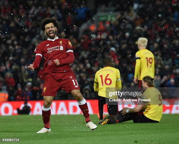 Mohamed Salah of Liverpool celebrates his Hat-Trick goal during the Premier League match between Liverpool and Watford at Anfield on March 17, 2018...