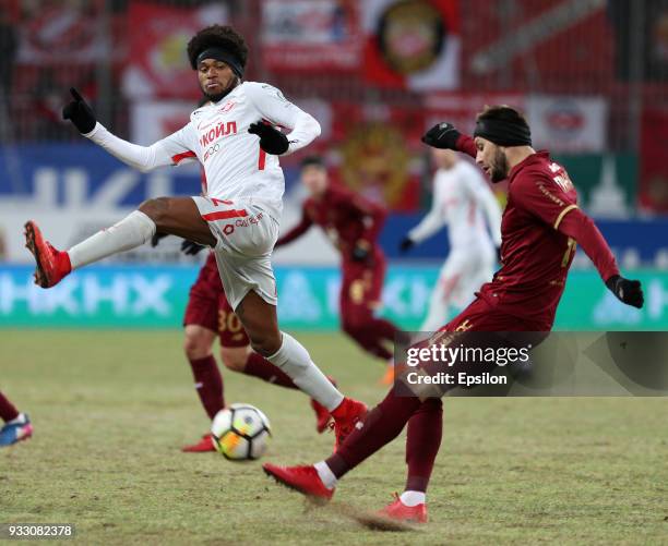 Vladimir Granatc of FC Rubin Kazan vies for the ball with Luiz Adriano FC Spartak Moscow during the Russian Premier League match between FC Rubin...