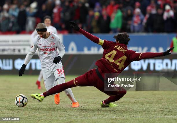 Cesar Navas of FC Rubin Kazan vies for the ball with Sofiane Hanni FC Spartak Moscow during the Russian Premier League match between FC Rubin Kazan...