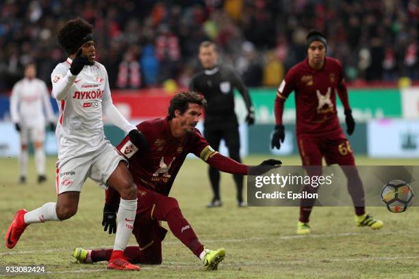 Cesar Navas of FC Rubin Kazan vies for the ball with Luiz Adriano FC Spartak Moscow during the Russian Premier League match between FC Rubin Kazan...