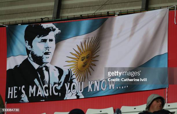 Banner with an image of Mauricio Pochettino manager / head coach of Tottenham Hotspur and the Argentina national flag during The Emirates FA Cup...