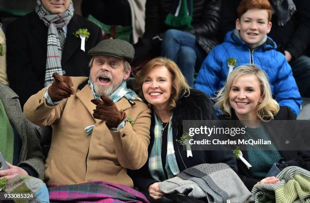 Actor Mark Hamill pictured with his wife Mary Lou Hamill and daughter Chelsea Hamill watch on as the annual Saint Patrick's day parade takes place on...