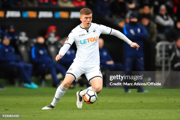 Alfie Mawson of Swansea City during the Emirates FA Cup Quarter Final match between Swansea City and Tottenham Hotspur at Liberty Stadium on March...