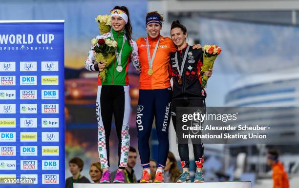 Marina Zueva of Belarus, Antoinette de Jong of the Netherlands and Ivanie Blondin of Canada stand on the podium after the Ladies 3000m Final during...