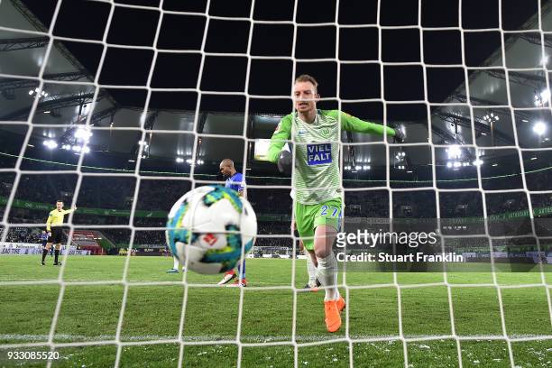 Maximilian Arnold of Wolfsburg looks dejected after Robin Knoche of Wolfsburg scored an own goal to make it 0:1, during the Bundesliga match between...