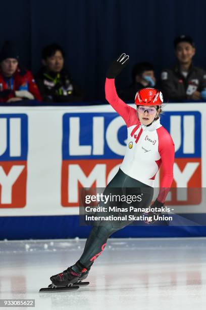 Kim Boutin of Canada acknowledges the fans after qualifying in the women's 1500 meter semifinals during the World Short Track Speed Skating...