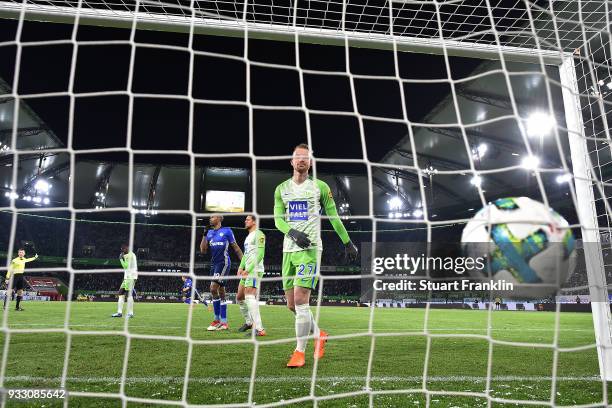 Maximilian Arnold of Wolfsburg looks dejected after Robin Knoche of Wolfsburg scored an own goal to make it 0:1, during the Bundesliga match between...