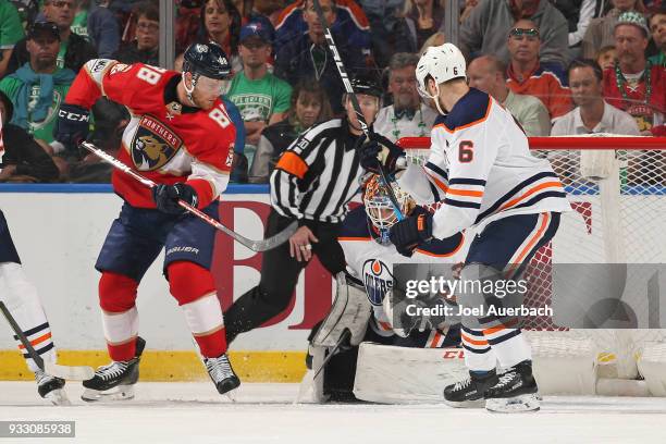 Goaltender Cam Talbot of the Edmonton Oilers stops a shot by Jamie McGinn of the Florida Panthers during a second period power play at the BB&T...