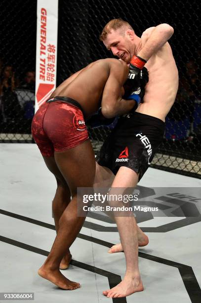 Danny Henry of Scotland attempts to submit Hakeem Dawodu in their featherweight bout inside The O2 Arena on March 17, 2018 in London, England.