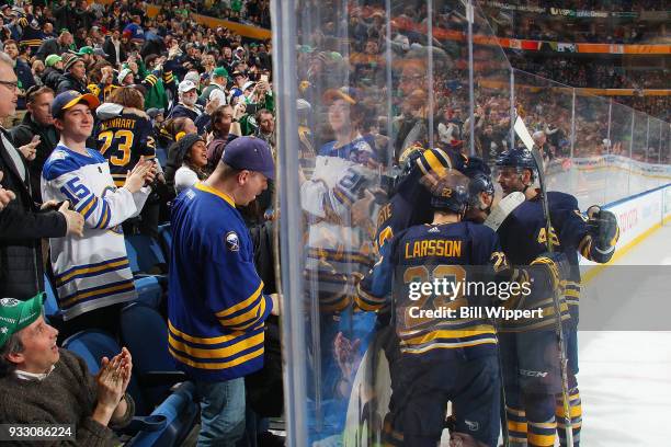 Nicholas Baptiste of the Buffalo Sabres celebrates his game-winning third period goal against the Chicago Blackhawks during an NHL game on March 17,...