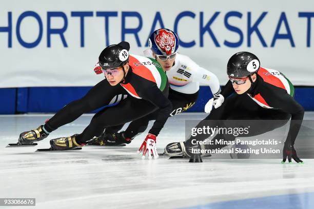 Shaolin Sandor Liu of Hungary takes the lead on Dae Heon Hwang of Korea and Shaoang Liu of Hungary competes in the men's 1500 meter semifinals during...
