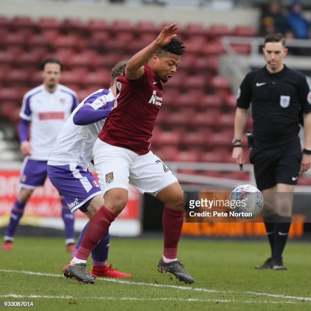 Hildeberto Pereira of Northampton Town controls the ball under pressure from Matt Palmer of Rotherham United during the Sky Bet League One match...