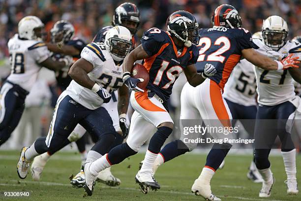 Eddie Royal of the Denver Broncos returns a kick off against the San Diego Chargers during NFL action at Invesco Field at Mile High on November 22,...