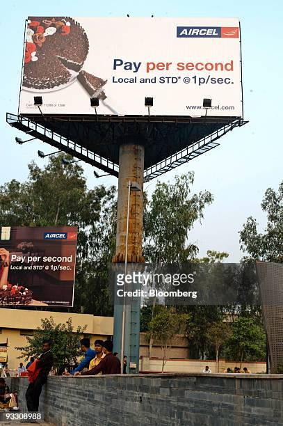 Billboard advertising reduced rates for the mobile phone provider Aircel Ltd. Stands in Noida, India, on Sunday, Nov. 22, 2009. India's 11 biggest...