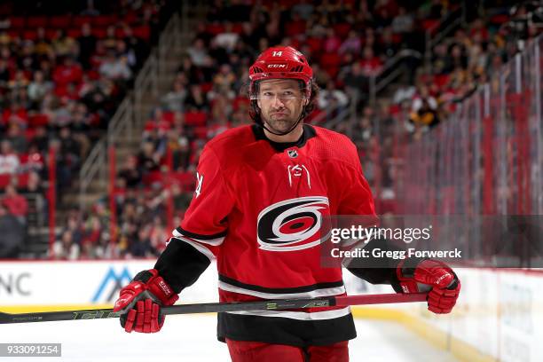Justin Williams of the Carolina Hurricanes prepares for a faceoff against the Boston Bruins during an NHL game on March 13, 2018 at PNC Arena in...