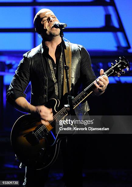 Musician Chris Daughtry of the band Daughtry performs onstage at the 2009 American Music Awards at Nokia Theatre L.A. Live on November 22, 2009 in...