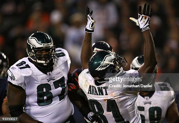 Jamaal Jackson and Jason Avant of the Philadelphia Eagles celebrate after Avant scored a 13-yard touchdown reception in the first quarter against the...