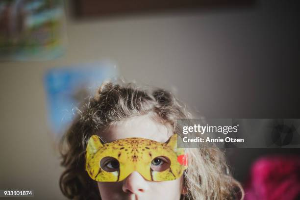 girl with cat mask - cat face mask stock-fotos und bilder