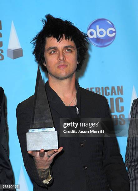 Musicians Mike Dirnt, Billie Joe Armstrong and Tre Cool of Green Da, winners of Alternative Rock Favorite Artist pose in the press room at the 2009...