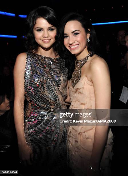 Selena Gomez and Demi Lovato at the 2009 American Music Awards at Nokia Theatre L.A. Live on November 22, 2009 in Los Angeles, California.