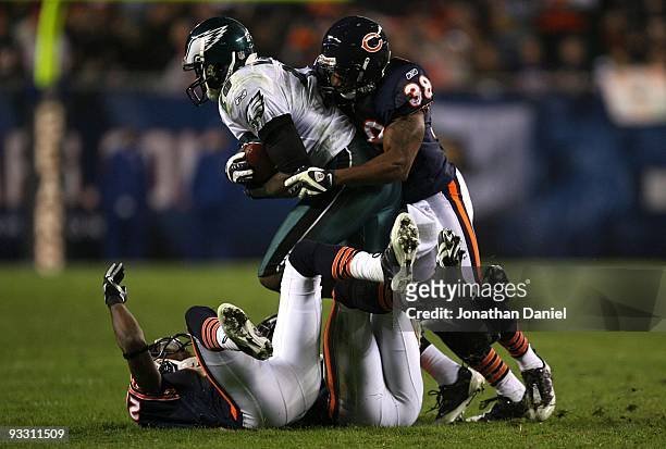 Danieal Manning of the Chicago Bears hits and tackles Jeremy Maclin of the Philadelphia Eagles as Maclin makes a reception in the second quarter at...