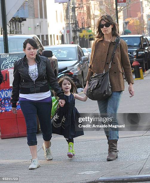 Isabella Cruise, Suri Cruise and Katie Holmes are seen downtown on November 22, 2009 in New York City.