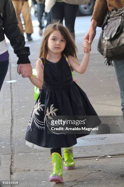 Suri Cruise is seen with Isabella Cruise and Katie Holmes downtown on November 22, 2009 in New York City.