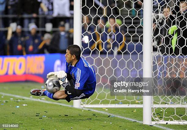 Nick Rimando of Real Salt Lake makes a save on a penalty kick by Edson Buddle of the Los Angeles Galaxy in the penalty shootout during the MLS Cup...