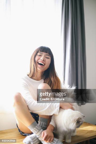 a woman and relaxing in the room - beautiful japanese women stock pictures, royalty-free photos & images