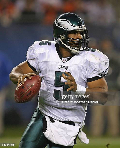 Donovan McNabb of the Philadelphia Eagles rolls out to pass against the Chicago Bears at Soldier Field on November 22, 2009 in Chicago, Illinois. The...