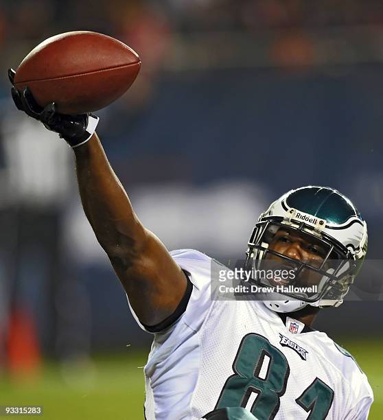 Wide Receiver Jason Avant of the Philadelphia Eagles celebrates a touchdown after catching a pass during the game against the Chicago Bears on...