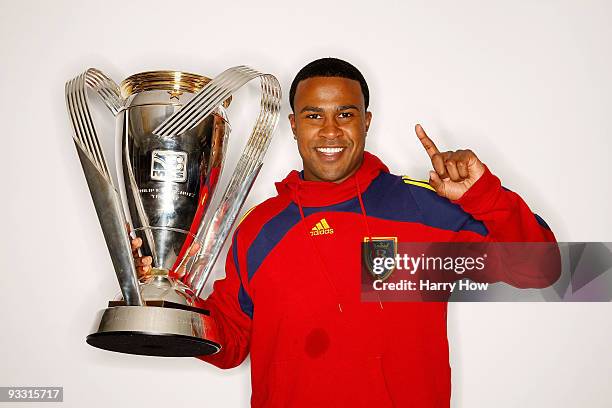 Robbie Findley of Real Salt Lake poses with the Philip F. Anschutz MLS Cup trophy following their win in the MLS Cup final at Qwest Field on November...