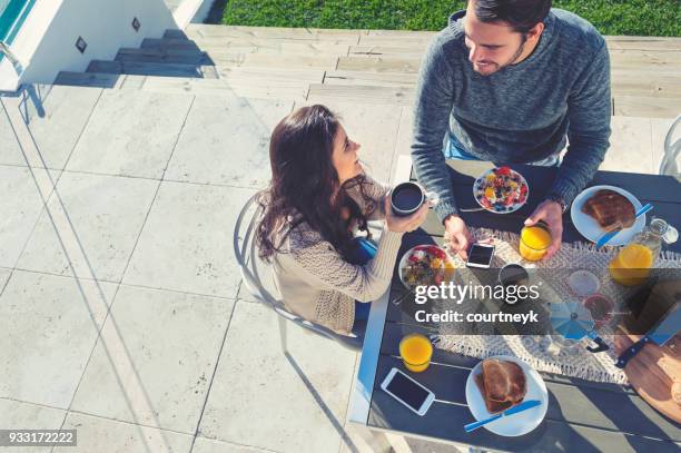 couple having a romantic breakfast. - restaurant sydney outside stock pictures, royalty-free photos & images