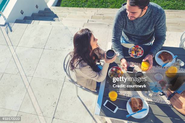 couple having a romantic breakfast. - sydney from above stock pictures, royalty-free photos & images