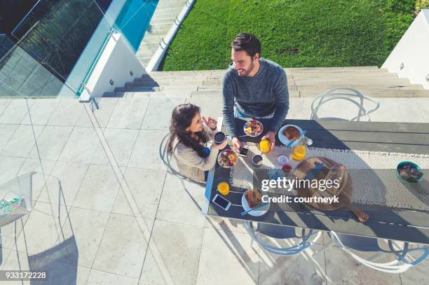 couple having a romantic breakfast. - sydney from above stock pictures, royalty-free photos & images