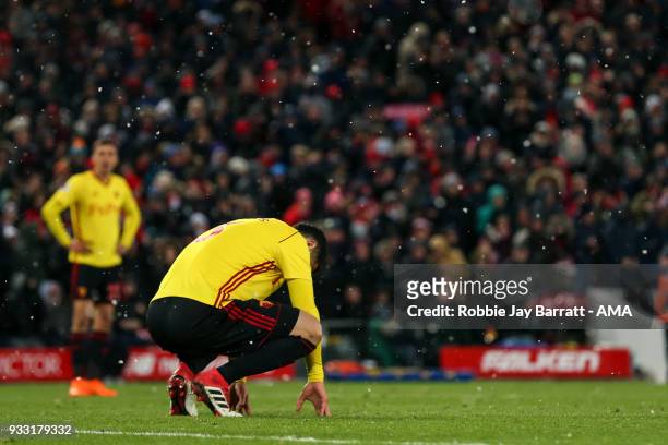 Miguel Angel Britos of Watford dejected during the Premier League match between Liverpool and Watford at Anfield on March 17, 2018 in Liverpool,...