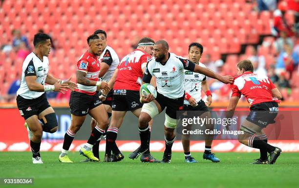 Albertus Kwagga Smith and Dylan Smith of Lions in action with Michael Leitch of Sunwolves during the Super Rugby match between Emirates Lions and...