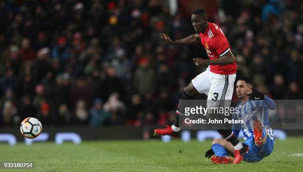 Eric Bailly of Manchester United in action with Beram Kayal of Brighton & Hove Albion during the Emirates FA Cup Quarter Final match between...