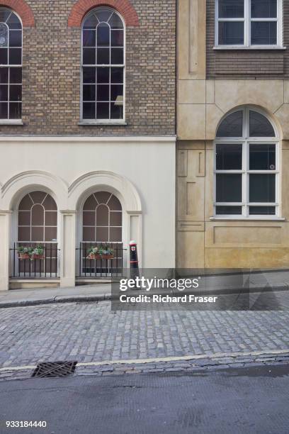 a mix of architectural styles in a london street - january 2018 stock pictures, royalty-free photos & images