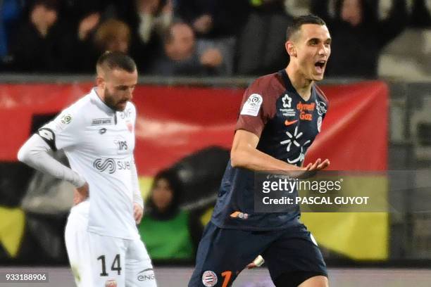 Montpellier's French midfielder Ellyes Skhiri celebrates after scoring a goal during the French L1 football match between MHSC Montpellier and Dijon,...