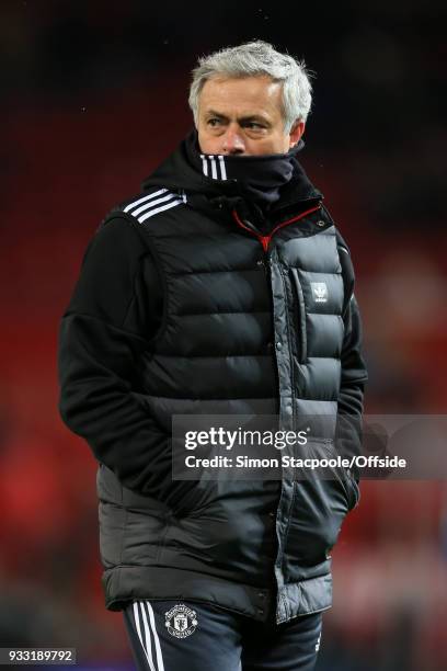 Man Utd manager Jose Mourinho wears a snood during The Emirates FA Cup Quarter Final match between Manchester United and Brighton and Hove Albion at...