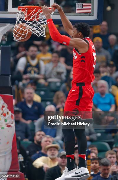 Malcolm Miller of the Toronto Raptors dunks the ball against the Indiana Pacers at Bankers Life Fieldhouse on March 15, 2018 in Indianapolis,...