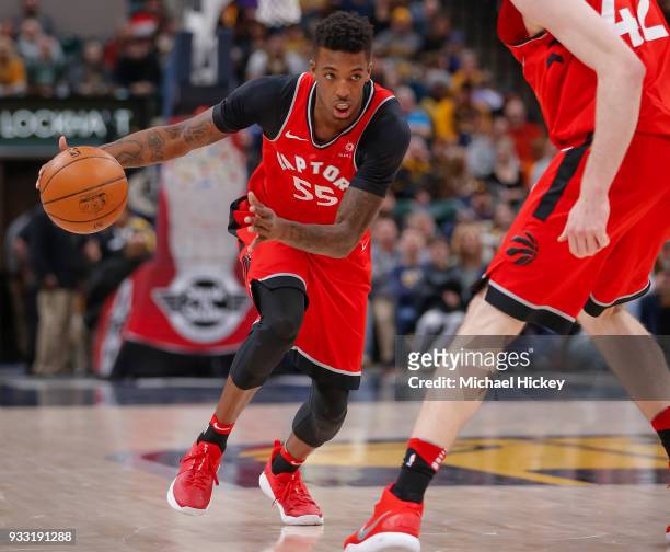 Delon Wright of the Toronto Raptors drives to the basket against the Indiana Pacers at Bankers Life Fieldhouse on March 15, 2018 in Indianapolis,...
