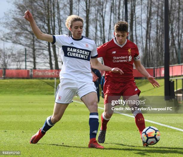 Adam Lewis of Liverpool and Billal Brahimi of Middlesbrough in action during the Liverpool v Middlesbrough U18 Premier League game at The Kirkby...